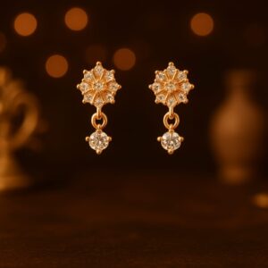 Artificial gold-tone floral stud earrings with crystal drop accents
