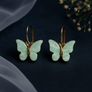 Elegant mint green butterfly earrings with gold outline – affordable jewelry by GlowingFusions Title: Mint Green Butterfly Earrings – GlowingFusions Affordable Jewelry Description: Stylish butterfly-shaped earrings with a mint green finish and gold detailing, perfect for adding a soft and graceful touch to any outfit. Designed by GlowingFusions as part of the affordable jewelry collection.