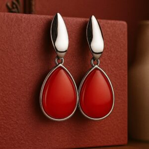 glowingfusions-red-teardrop-dangle-earrings.jpg Alt Text: Artificial red teardrop dangle earrings with silver outline – GlowingFusions